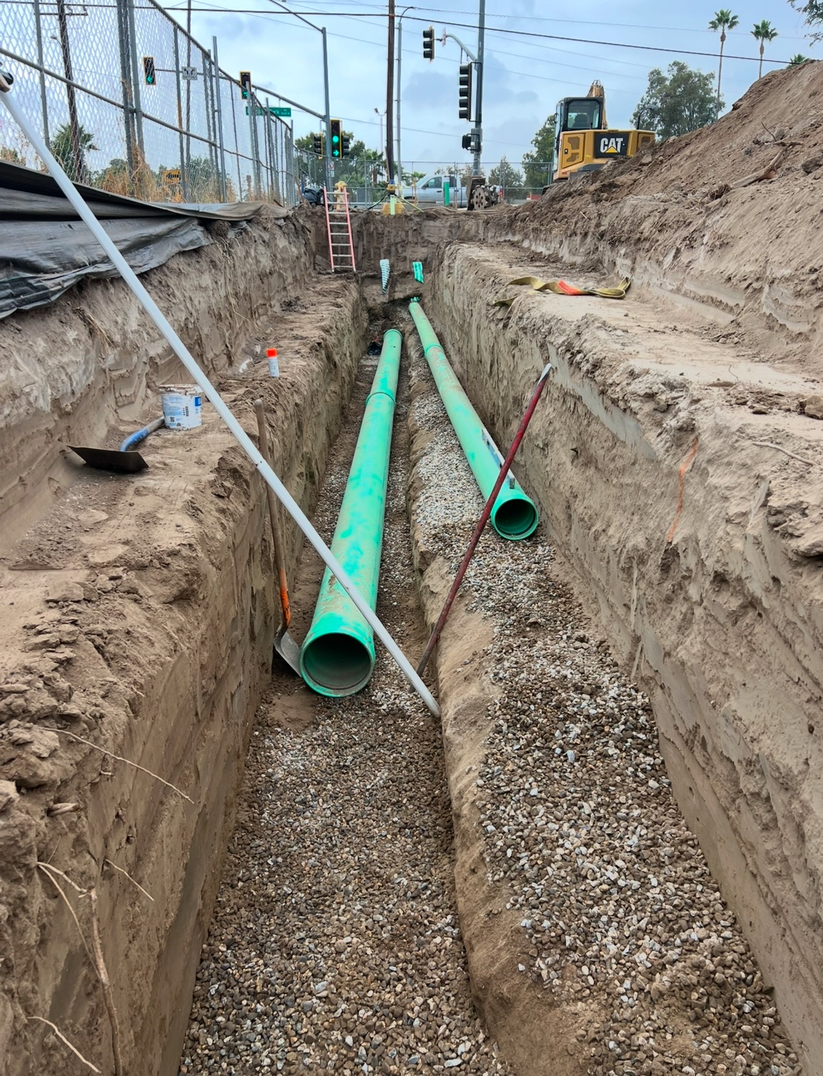 Green sewer main in an open trench